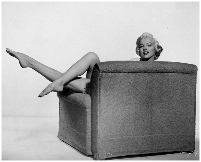 marilyn-monroe-january-1955-e28093-hiding-in-a-chair-in-the-seven-year-itch-pa-photo
